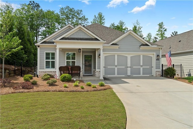 52 Lantern Trce, Hiram, GA 30141 - craftsman-style house with a front lawn, fence, covered porch, an attached garage, and driveway