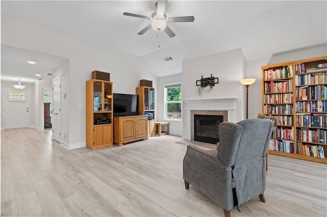 52 Lantern Trce, Hiram, GA 30141 - living room with a glass covered fireplace, ceiling fan, light wood finished floors, and visible vents