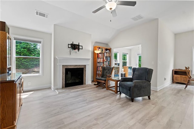 52 Lantern Trce, Hiram, GA 30141 - sitting room with a premium fireplace, ceiling fan, light wood-type flooring, and visible vents