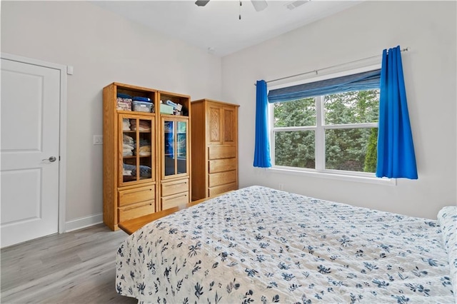 52 Lantern Trce, Hiram, GA 30141 - bedroom with baseboards, ceiling fan, and light wood finished floors