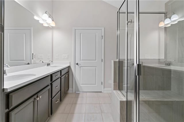 52 Lantern Trce, Hiram, GA 30141 - bathroom featuring a sink, tile patterned flooring, a shower stall, and double vanity