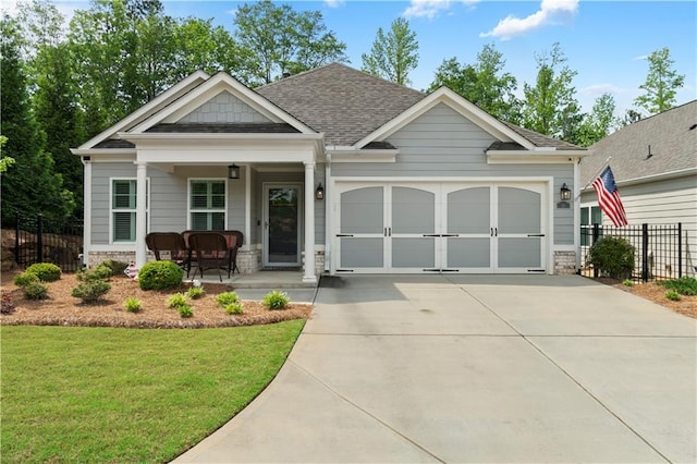52 Lantern Trce, Hiram, GA 30141 - craftsman house with fence, a front lawn, a garage, covered porch, and driveway
