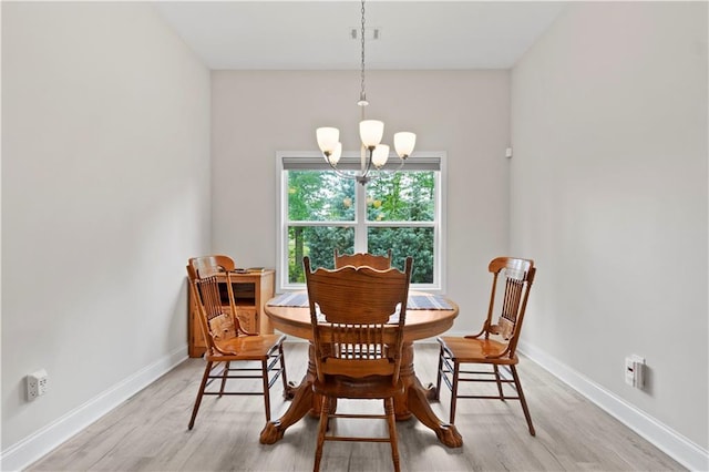 52 Lantern Trce, Hiram, GA 30141 - dining room featuring baseboards, visible vents, light wood-type flooring, and a chandelier