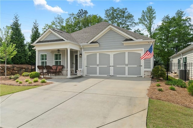 52 Lantern Trce, Hiram, GA 30141 - craftsman house featuring fence, a shingled roof, a garage, a porch, and driveway
