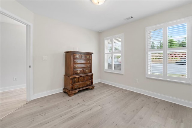 52 Lantern Trce, Hiram, GA 30141 - spare room with baseboards, visible vents, and light wood-type flooring