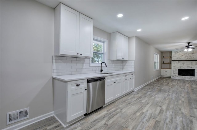 380 Inman Rd, Fayetteville, GA 30215 - kitchen with dishwasher, a sink, baseboards, light countertops, and open floor plan
