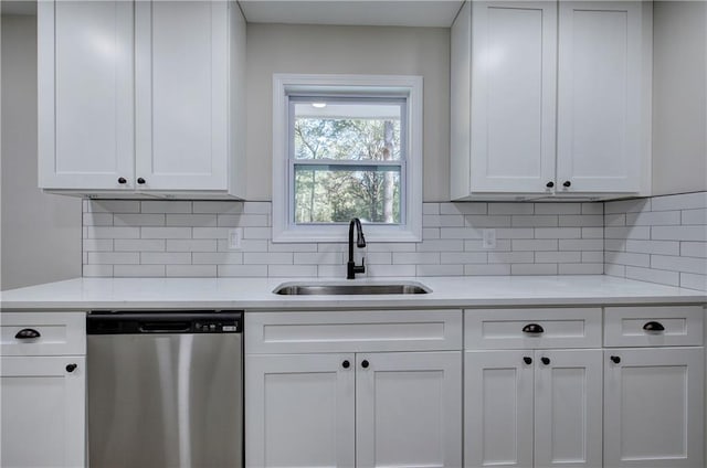 380 Inman Rd, Fayetteville, GA 30215 - kitchen with dishwasher, a sink, light countertops, and white cabinetry