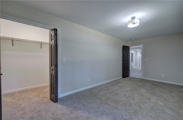380 Inman Rd, Fayetteville, GA 30215 - unfurnished bedroom with carpet floors and baseboards