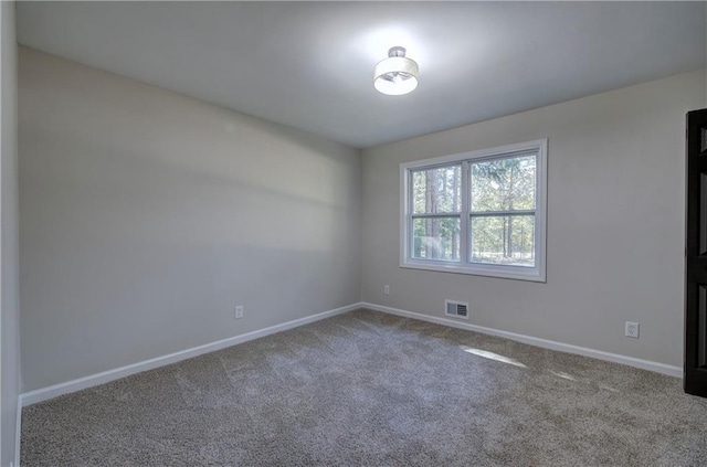 380 Inman Rd, Fayetteville, GA 30215 - carpeted empty room featuring baseboards
