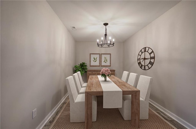 380 Inman Rd, Fayetteville, GA 30215 - dining area with a chandelier, baseboards, and light wood-type flooring
