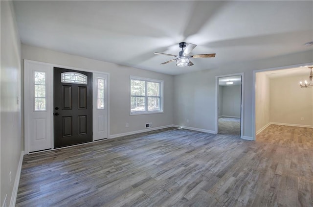 380 Inman Rd, Fayetteville, GA 30215 - entryway featuring a chandelier, wood finished floors, baseboards, and ceiling fan