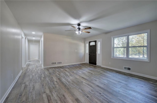 380 Inman Rd, Fayetteville, GA 30215 - foyer with wood finished floors, ceiling fan, and baseboards