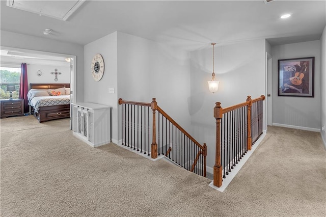 216 Orchard Trl, Canton, GA 30115 - hall featuring an upstairs landing, carpet floors, attic access, baseboards, and recessed lighting