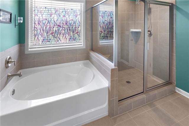 216 Orchard Trl, Canton, GA 30115 - full bath featuring a garden tub, a stall shower, and tile patterned flooring