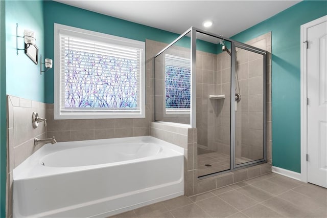 216 Orchard Trl, Canton, GA 30115 - full bath featuring a bath, a stall shower, and tile patterned floors