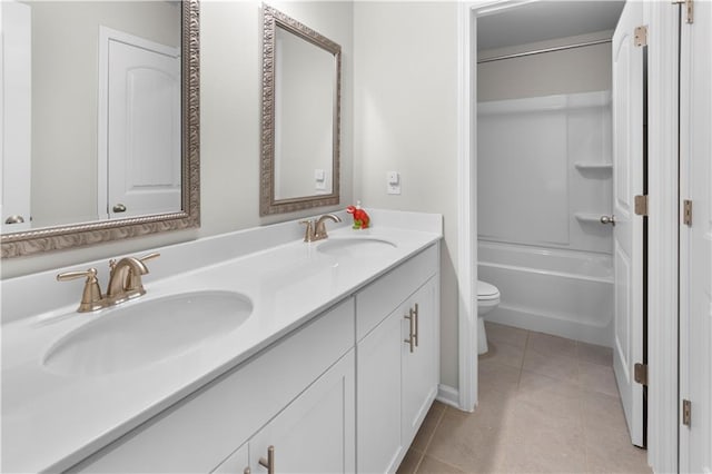 216 Orchard Trl, Canton, GA 30115 - bathroom with toilet, double vanity, tile patterned floors, and  shower combination