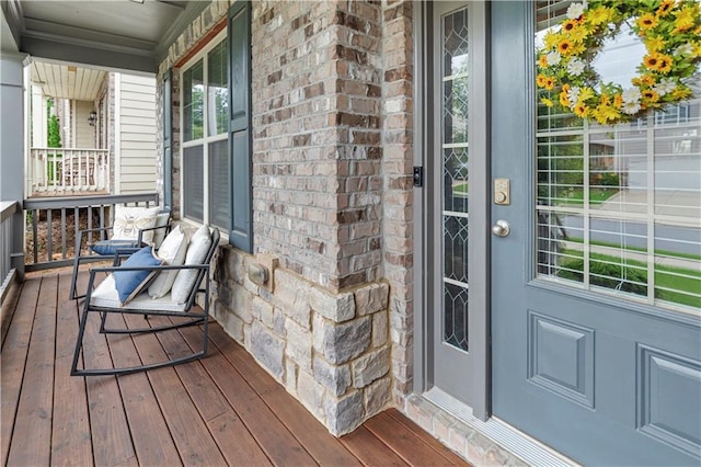 216 Orchard Trl, Canton, GA 30115 - view of exterior entry with a porch and brick siding