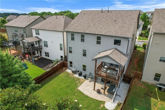 216 Orchard Trl, Canton, GA 30115 - rear view of property with a patio, a deck, a residential view, and roof with shingles