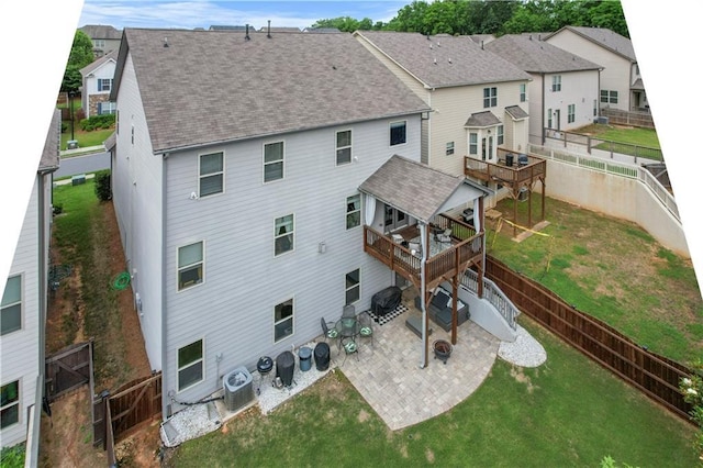 216 Orchard Trl, Canton, GA 30115 - rear view of property featuring a patio area, a wooden deck, cooling unit, roof with shingles, and a residential view