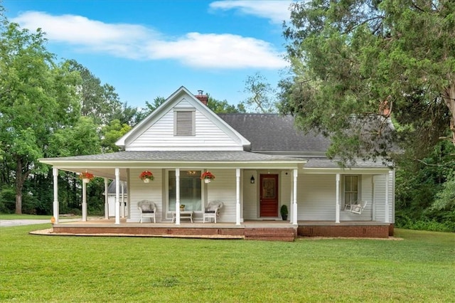 1238 Macland Rd, Dallas, GA 30132 - farmhouse featuring a porch, a front yard, and roof with shingles