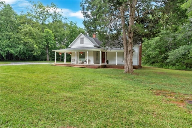 1238 Macland Rd, Dallas, GA 30132 - farmhouse inspired home featuring covered porch, a chimney, and a front lawn