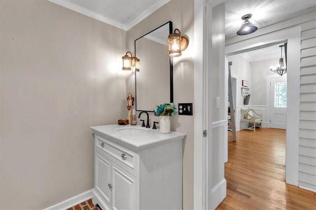 1238 Macland Rd, Dallas, GA 30132 - bathroom with vanity, crown molding, a chandelier, and wood finished floors