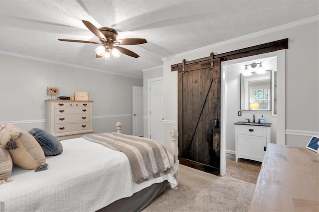 1238 Macland Rd, Dallas, GA 30132 - bedroom featuring a barn door, crown molding, a ceiling fan, and light colored carpet