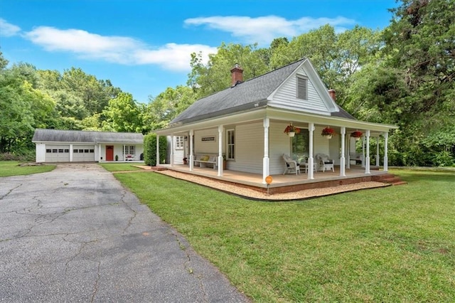 1238 Macland Rd, Dallas, GA 30132 - farmhouse with a porch, a front lawn, a garage, a chimney, and driveway