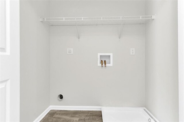 2146 Silva Ct, Conley, GA 30288 - washroom with washer hookup, wood finished floors, electric dryer hookup, and baseboards
