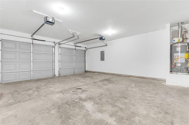 2146 Silva Ct, Conley, GA 30288 - garage with water heater, a garage door opener, and electric panel