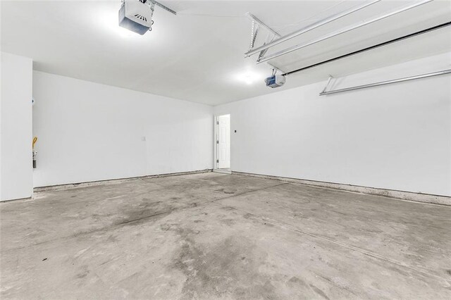 2146 Silva Ct, Conley, GA 30288 - garage featuring a garage door opener