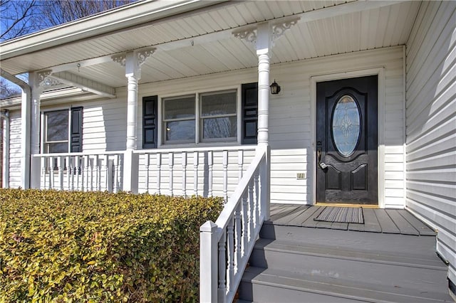 entrance to property with a porch