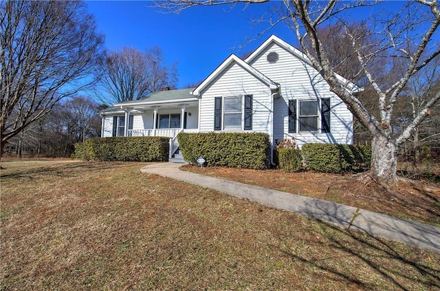 view of front of home featuring a porch and a front yard