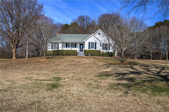 single story home with a porch and a front yard