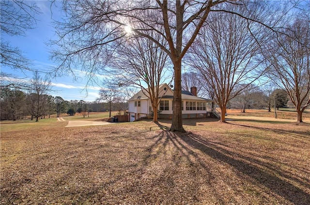 exterior space with a front yard