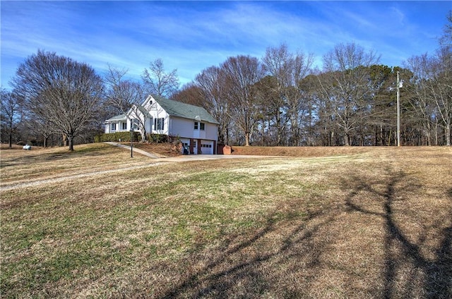 view of yard featuring a garage