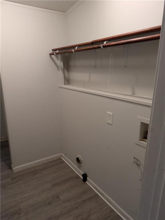 laundry room with washer hookup, laundry area, baseboards, electric dryer hookup, and wood finished floors