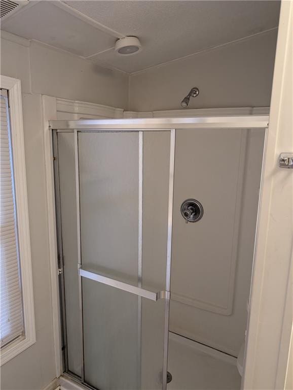 full bath featuring a stall shower
