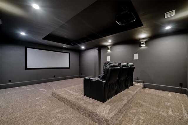 home theater room with visible vents, carpet flooring, and baseboards