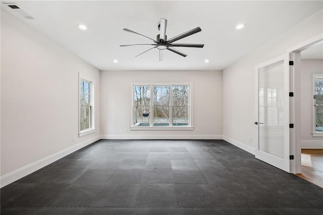 empty room featuring recessed lighting, baseboards, and ceiling fan