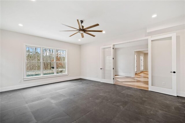 spare room with french doors, baseboards, recessed lighting, and ceiling fan