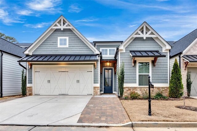 view of front of property featuring a garage