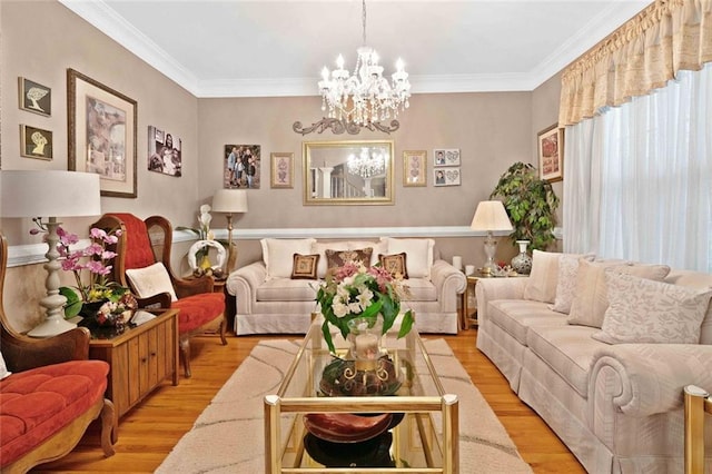 580 River Valley Dr, Dacula, GA 30019 - living room with light wood-type flooring, a chandelier, and crown molding