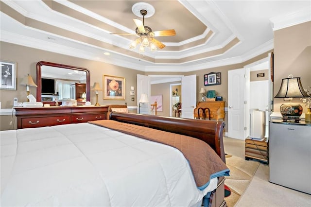 580 River Valley Dr, Dacula, GA 30019 - bedroom featuring a tray ceiling, ornamental molding, freestanding refrigerator, and light colored carpet