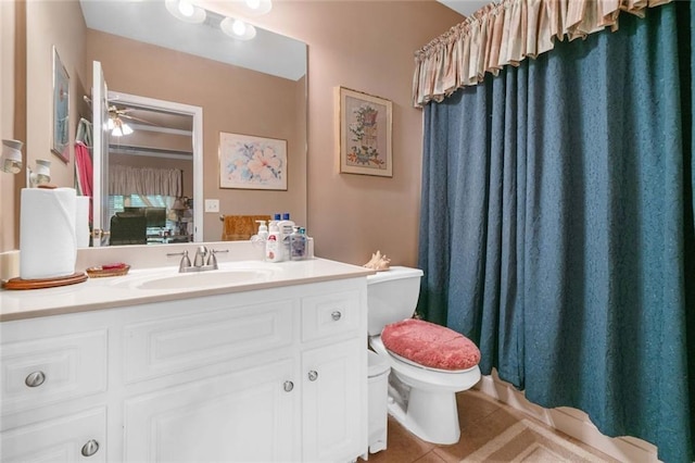 580 River Valley Dr, Dacula, GA 30019 - bathroom featuring toilet, tile patterned flooring, vanity, a ceiling fan, and a shower with curtain