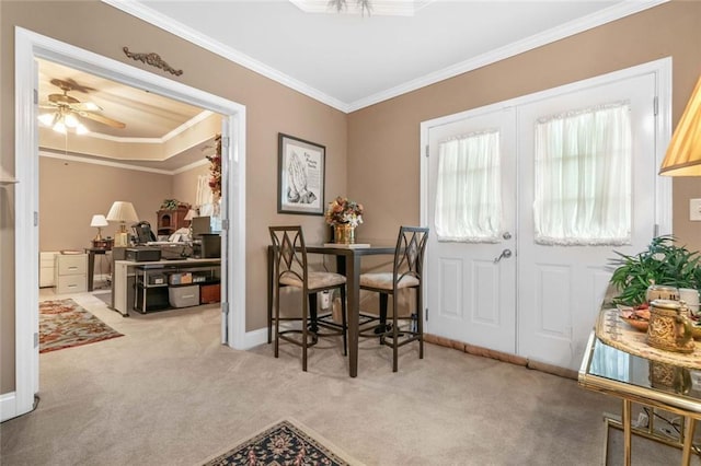 580 River Valley Dr, Dacula, GA 30019 - carpeted dining area with crown molding, ceiling fan, french doors, and baseboards