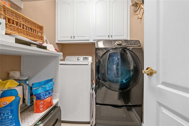580 River Valley Dr, Dacula, GA 30019 - laundry room with independent washer and dryer and cabinet space