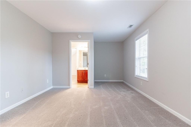 view of carpeted spare room