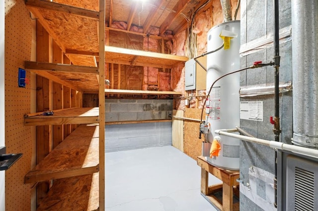 interior space featuring heating unit and gas water heater