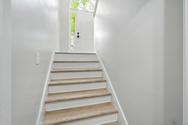 stairway with baseboards